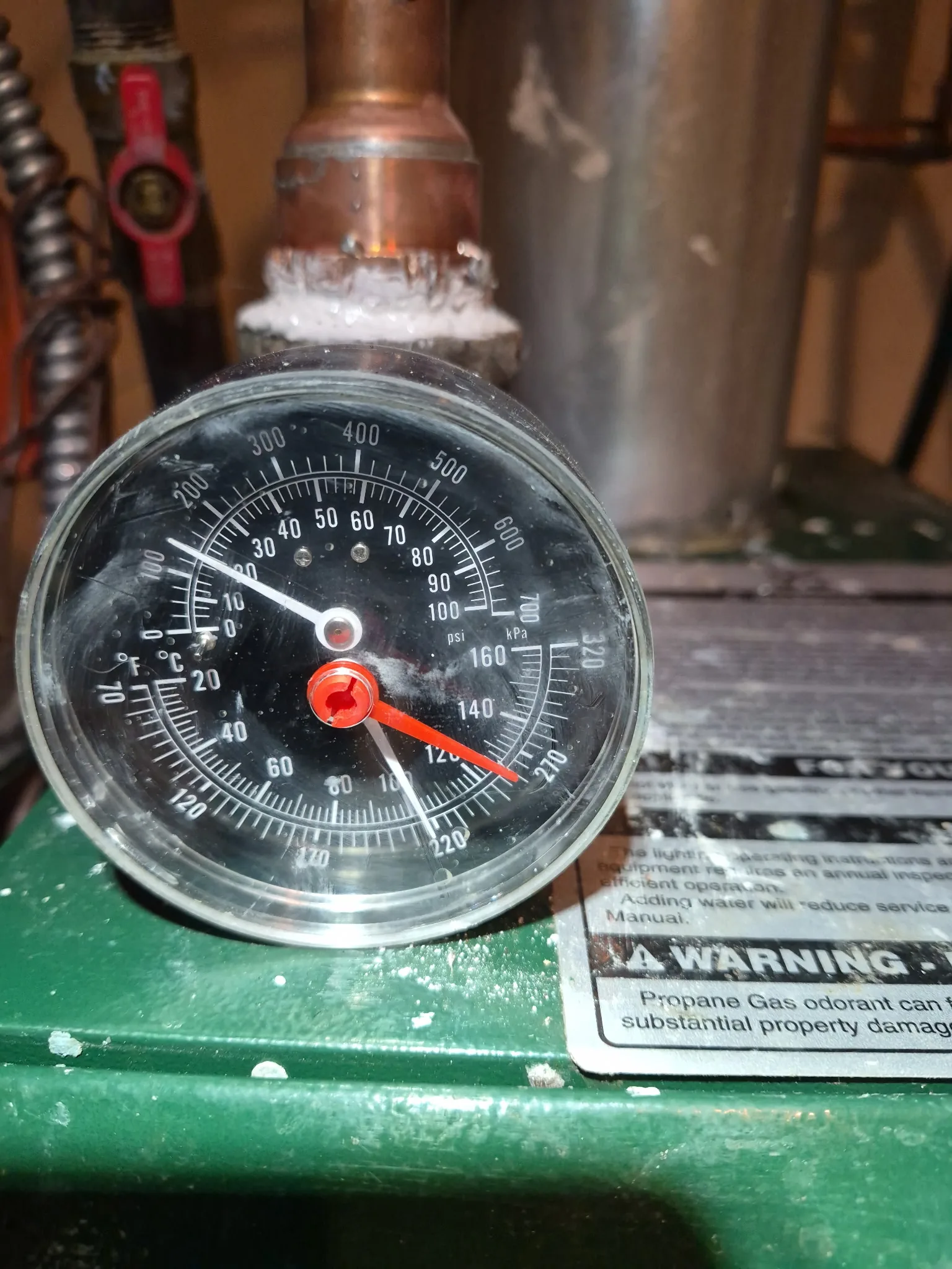 Boiler pressure gauge showing reading on Denver boiler system